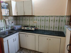 Kitchen in 1.5 BHK Builder Floor at Canal Road – for Rent