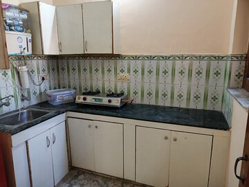 Kitchen in 1.5 BHK Builder Floor at Canal Road – for Rent