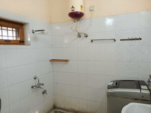Bathroom in 1.5 BHK Builder Floor at Canal Road – for Rent