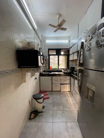 Kitchen in 2 BHK Apartment at Hira Panna CHS, Mira Road East – for Sale