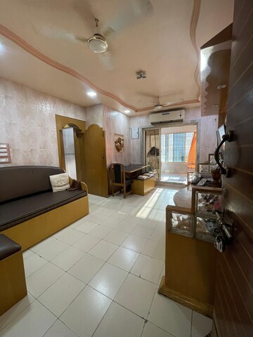Living Room in 2 BHK Apartment at Hira Panna CHS, Mira Road East – for Sale