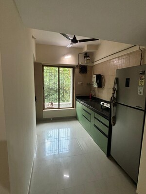 Kitchen in 1 BHK Apartment at Raunak Heights, Ghodbunder Road – for Rent