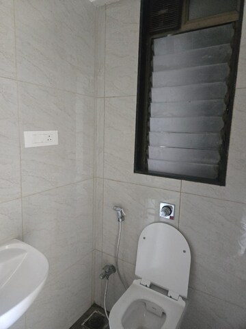 Bathroom in 2 BHK Apartment at Chandak 34 Park Estate, Goregaon West – for Rent