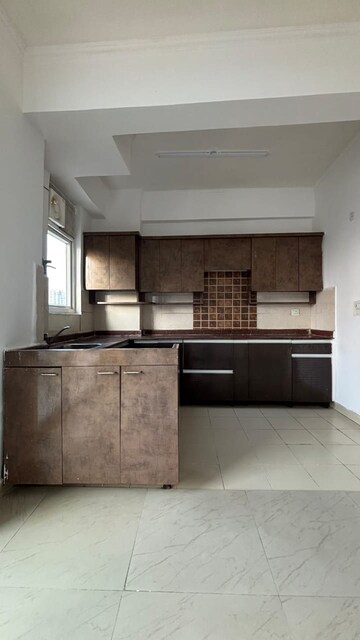 Kitchen in 3 BHK Apartment at Geotech Pristine Avenue, Sector 16c Greater Noida – for Sale