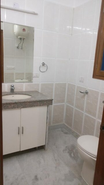 Bathroom in 3 BHK Builder Floor at Defence Colony – for Rent