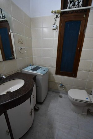 Bathroom in 3 BHK Builder Floor at Defence Colony – for Rent