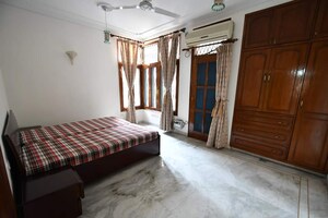 Bedroom in 3 BHK Builder Floor at Defence Colony – for Rent