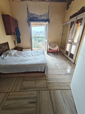 Bedroom in 2 BHK Apartment at Razak Zamzam Tower, Mazgaon – for Rent