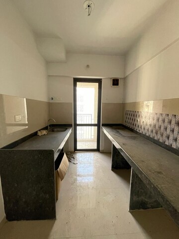 Kitchen in 1 BHK Apartment at Lodha Palava City Lakeshore Greens, Dombivli East – for Sale