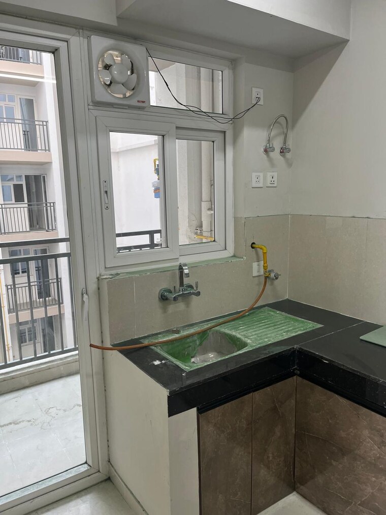 Kitchen, eldeco-live-by-the-greens 3 Bedroom 1404 Sq.Ft. Apartment In Sector 150 Noida 9307288