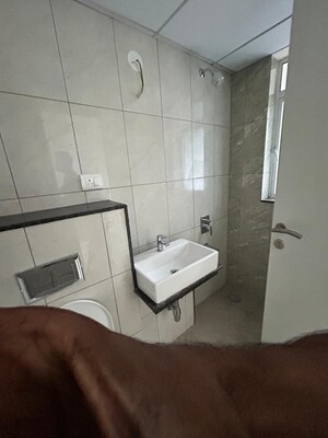 Bathroom in 3 BHK Apartment at Godrej Green Vistas, Mahalunge – for Rent
