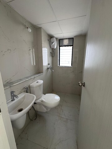 Bathroom in 1 BHK Apartment at Runwal Gardens, Dombivli East – for Sale