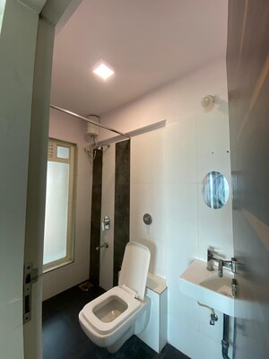Bathroom in 3 BHK Apartment at Gurukrupa Marina Enclave, Malad West – for Rent