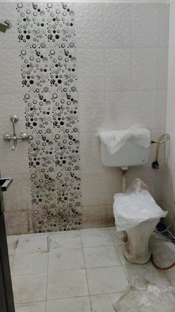 Bathroom in 2 BHK Apartment at Pardos Okas Residency, Sushant Golf City – for Rent