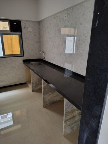 Kitchen in 3 BHK Apartment at Nextera Ketan CHS, Tembhi Naka – for Rent