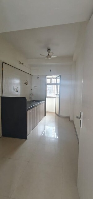 Kitchen in 3 BHK Apartment at Sufalam Apartment Chembur, Chembur – for Rent
