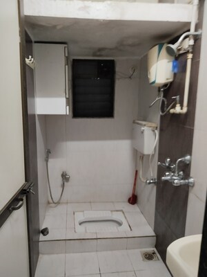 Bathroom in 2 BHK Apartment at New Vegas Plaza, Owale – for Rent