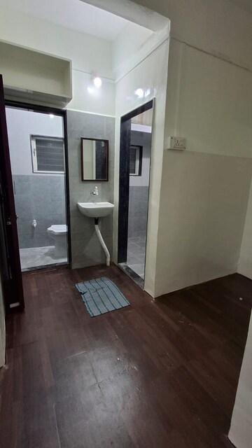 Bathroom in 1 BHK Apartment at Raikar Park Apartments, Anand Nagar – for Rent