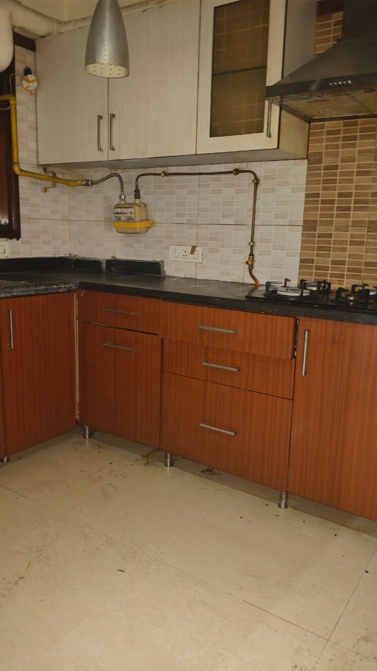 Kitchen, chittaranjan park 3 Bedroom 217 Sq.Yd. Builder Floor In Chittaranjan Park Delhi 9307846