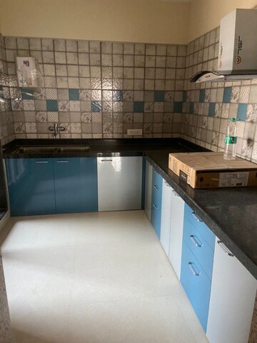 Kitchen in 3 BHK Apartment at Paradise Lifespaces Sai World City, New Panvel – for Sale