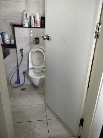 Bathroom in 2 BHK Apartment at Amanora Gold Towers, Hadapsar – for Sale