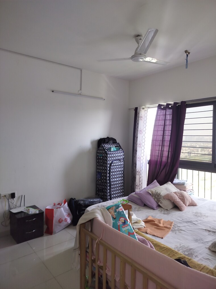 Living Room, amanora-gold-towers 2 Bedroom 646 Sq.Ft. Apartment In Hadapsar Pune 9308018