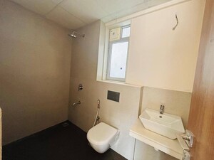 Bathroom in 2 BHK Apartment at Piramal Vaikunth, Balkum Pada – for Rent