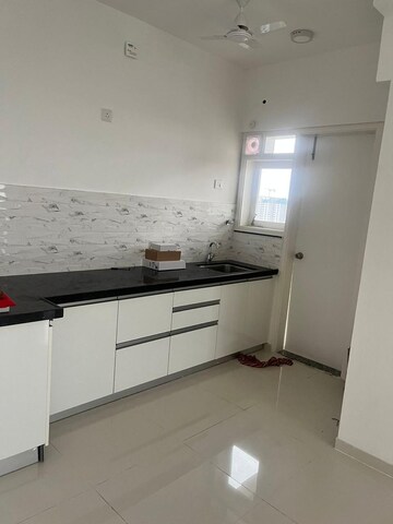 Kitchen in 2 BHK Apartment at Amanora Gold Towers, Hadapsar – for Rent