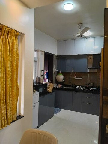 Kitchen in 3 BHK Apartment at Dhanvantari Terrace CHS, Erandwane – for Rent