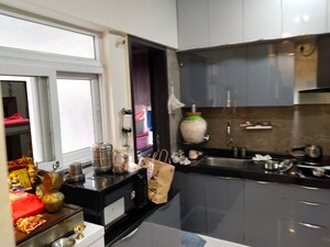 Kitchen in 3 BHK Apartment at Dhanvantari Terrace CHS, Erandwane – for Rent