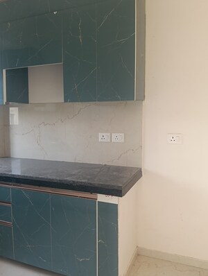 Kitchen in 2.5 BHK Apartment at Smart World Gems, Sector 89 – for Rent