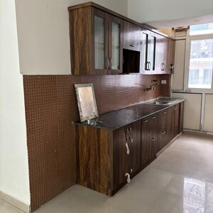 Kitchen in 2 BHK Apartment at Amrapali Heartbeat City, Sector 107 – for Rent