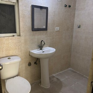 Bathroom in 2 BHK Apartment at Amrapali Heartbeat City, Sector 107 – for Rent