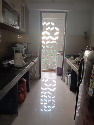 Kitchen in 1.5 BHK Apartment at Lodha Palava City Lakeshore Greens, Dombivli East – for Rent
