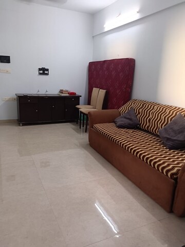 Living Room in 1.5 BHK Apartment at Lodha Palava City Lakeshore Greens, Dombivli East – for Rent