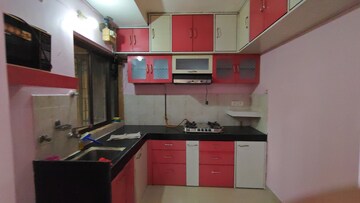 Kitchen in 2 BHK Apartment at Runwal Garden City, Balkum Pada – for Rent