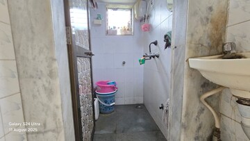 Bathroom in 1 BHK Apartment at Rishikesh CHS, Malad West – for Sale