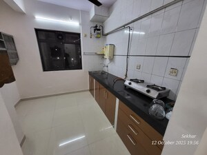 Kitchen in 1 BHK Apartment at Happy Valley, Manpada – for Rent
