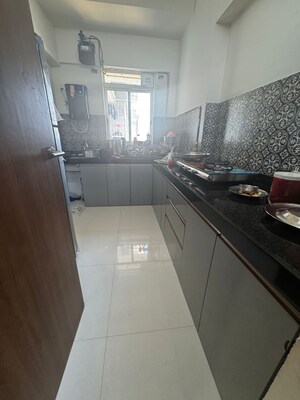 Kitchen in 2 BHK Apartment at Lodha Amara, Kolshet Road – for Sale
