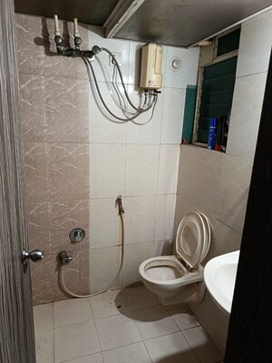 Bathroom in 2 BHK Apartment at Malad East – for Sale