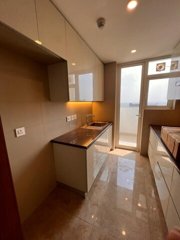 Kitchen in 3.5 BHK Apartment at Adani Oyster Arcade, Sector 102 – for Sale