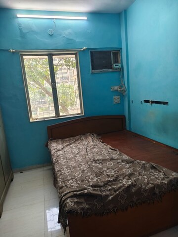 Bedroom in 1 BHK Apartment at Rishikesh CHS, Malad West – for Rent