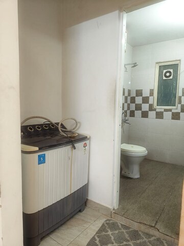 Bathroom in 1 BHK Apartment at Chattarpur – for Sale