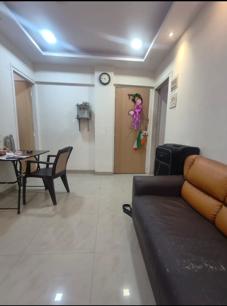 Living Room, dheeraj-ganga 1 Bedroom 610 Sq.Ft. Apartment In Malad West Mumbai 9308403