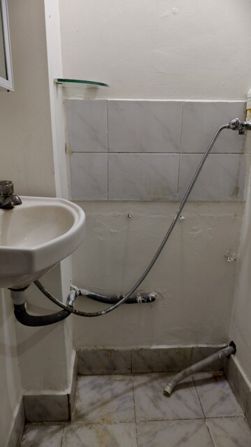 Bathroom in 1 RK Apartment at Vasant Valley Complex, Malad East – for Rent