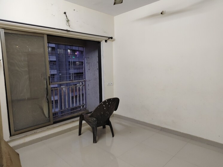 Living Room, unique-poonam-estate-cluster-2 2 Bedroom 674 Sq.Ft. Apartment In Mira Road Thane 9308477