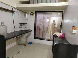 Kitchen in 2 BHK Apartment at Unique Poonam Estate Cluster 2, Mira Road – for Rent