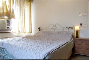 Bedroom in 1 BHK Apartment at Ajmera Odyessey Apartment, Bhakti Park – for Rent