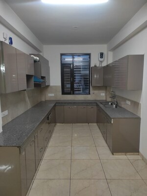 Kitchen in 3.5 BHK Apartment at Emaar Imperial Gardens, Sector 102 – for Sale