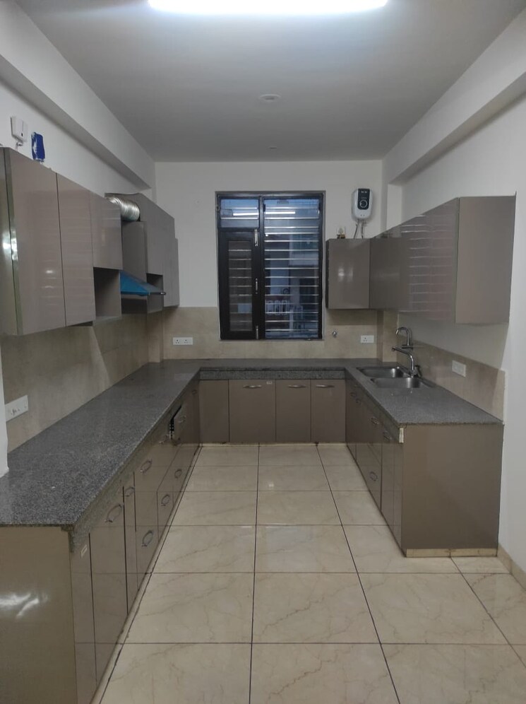 Kitchen, emaar-imperial-gardens 3.5 Bedroom 2000 Sq.Ft. Apartment In Sector 102 Gurgaon 9308653